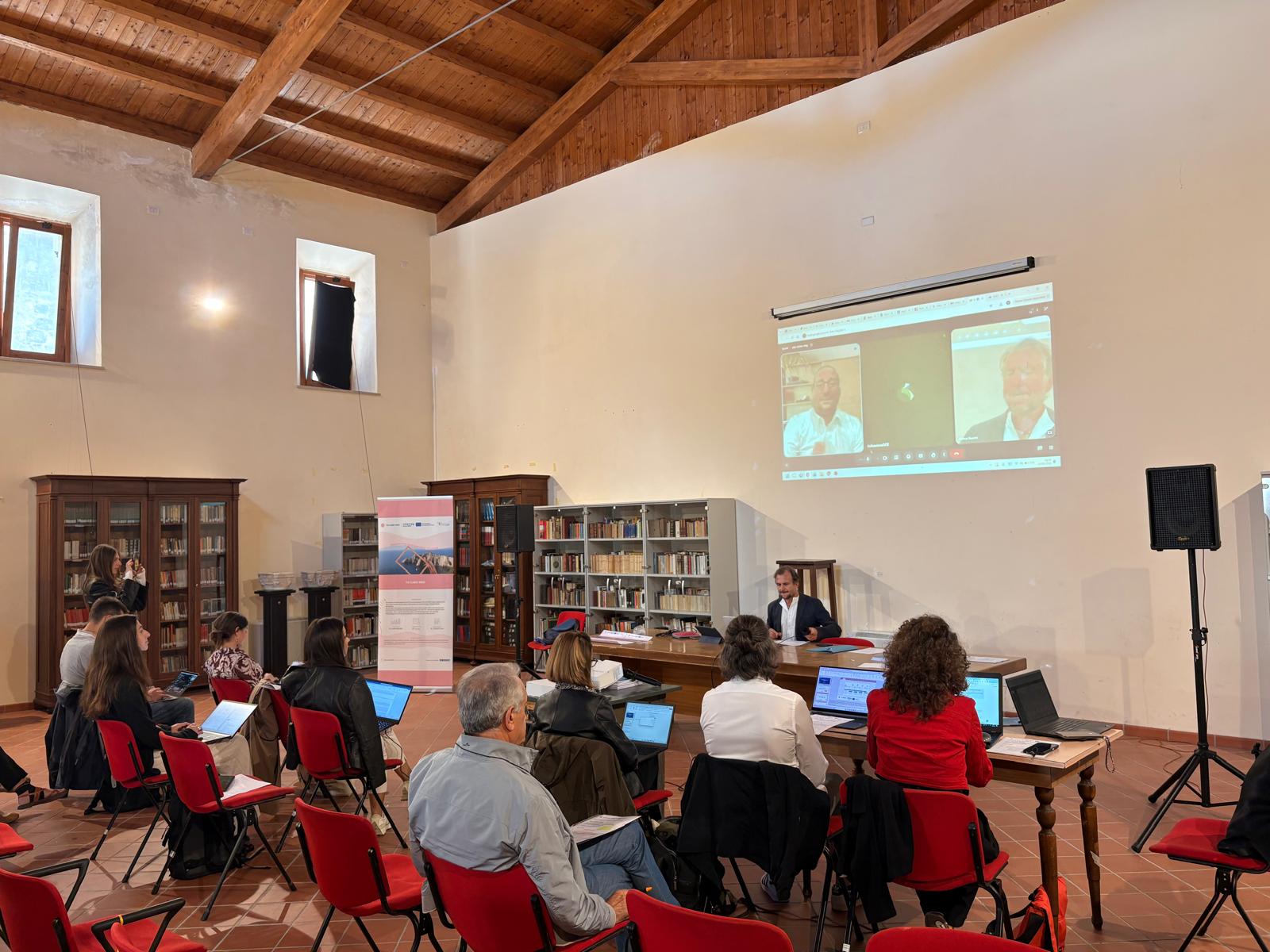 4th meeting of the partner to care med in Molise, the room with people on pc working